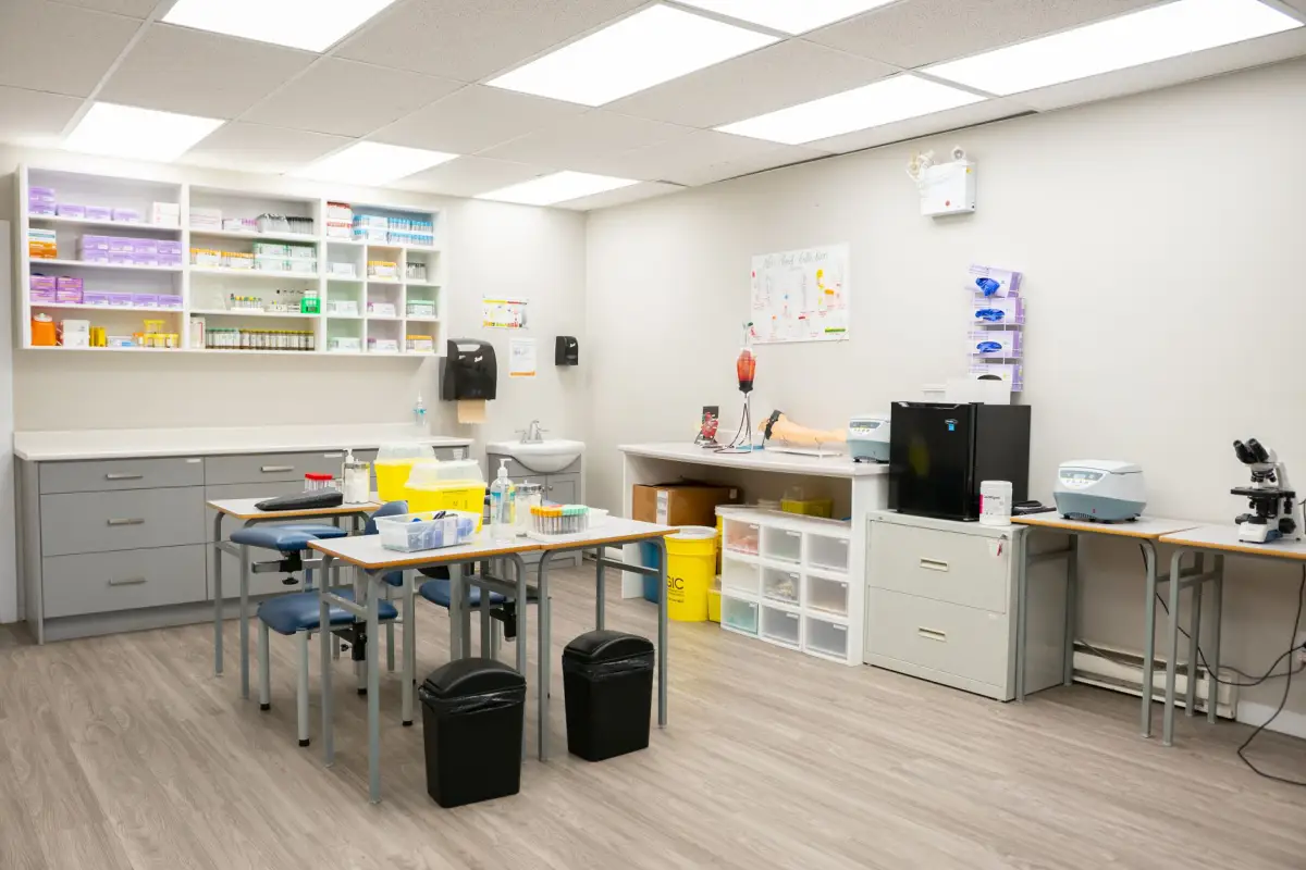 Organized medical office storage room with cabinetry and lab equipment